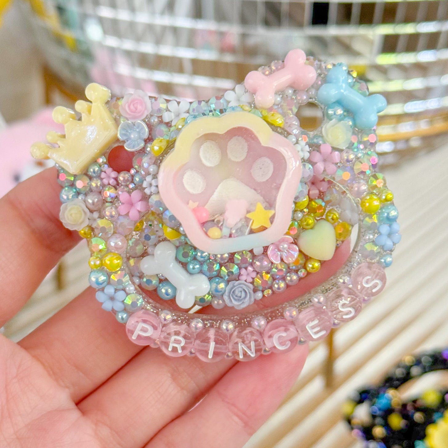 Princess Paw Pacifier (dry rattle shaker)